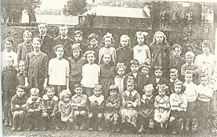 Miss Esler (Principal) and Miss Anderson with the pupils of The Palentine School just before its closure.