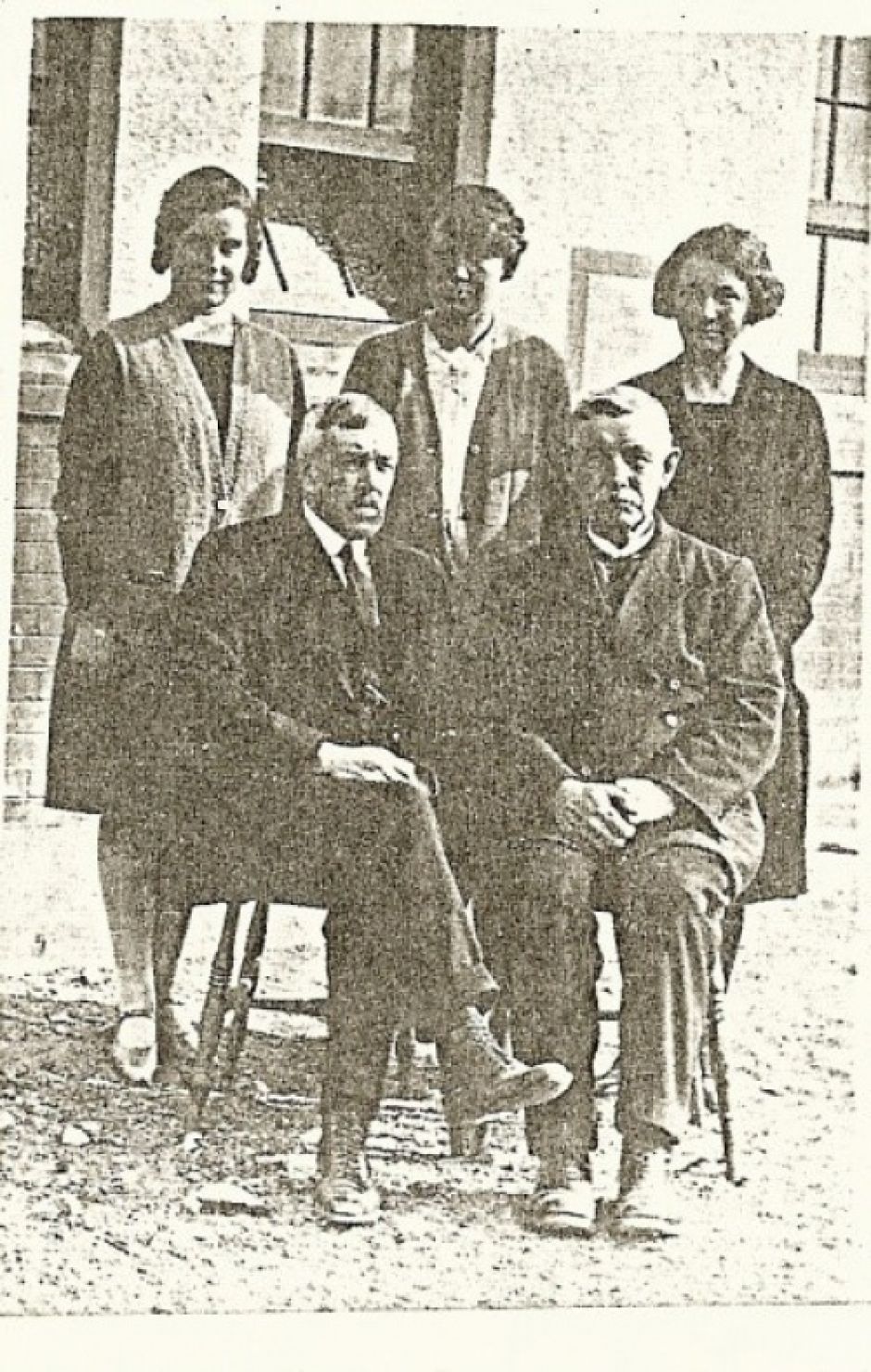 The first staff with Dr. Thompson, seated on the left in the front row.